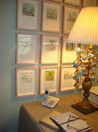 A Group Of Framed Pages From A Travel Sketchbook Makes A Charming Display And Forms The Impression Of A Window Bee Cottage Bedroom Art Gallery Wall Framed Art