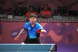 A table tennis table is 9 feet long, 5 feet wide and 2 feet 6 inches high, according to the international table tennis federation. Lin Yun Ju Wikipedia