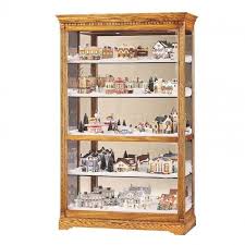 With a detailed design and premium materials Parkview Curio Cabinet Howard Miller Furniture Cart