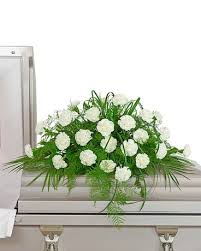 There are two kinds of casket spray funeral flowers, the first is a half casket spray. White Divinity Casket Spray In Havre De Grace Md Amanda S Florist