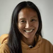 This is my sister Heidi Ilustre -Boatright. She's a former Wahine. She  played from 1995-1999. She then played AVP, FIVB and she coaches sand in  CO. She's an amazing person. She and