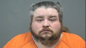 Police say suspect in Struthers shot at repo man