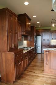 These are either made from cherry wood or made from maple and oak. Kitchen Rustic Cherry Wood W Rose Gold Hardware Cherry Wood Kitchen Cabinets Cherry Wood Kitchens Wood Kitchen