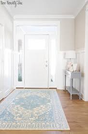We installed new gold cabinet hardware for the finishing touch. Worldly Gray A Great Neutral Greige