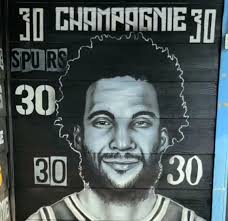 Rudy's Seafood in San Antonio with the Wembanyama Mural.…..