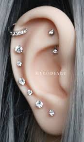ear piercing ideas for women earrings piercings earringspiercings women piercing ideen idees de piercing plusieurs piercings a l oreille piercings