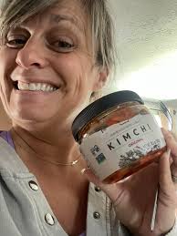 Is kimchi supposed to be spicy? The hot pepper flakes which i buy from the  korean section of the asian supermarket isnt spicy.