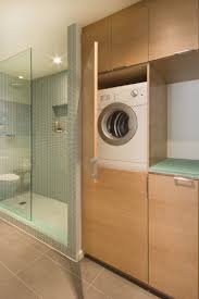 A Way To Hide Washer Dryer Laundry In Bathroom Ideas Laundry In Bathroom Tiny Bathroom Storage Laundry Room Organization Storage