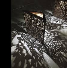 Zen And The Shadow Art Of The Riddled Table Ultra Modern Furniture Shadow Art Steven Holl