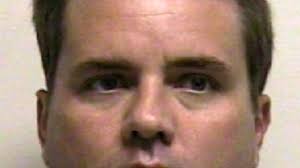 Former defense attorney arrested