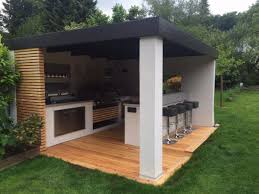 This Outdoor Kitchen With A Window On Ceiling To Open Up For Natural Lighting Plus Let Smoke Out When Cooking Grilli Grill Unterstand Garten Kuche Hintergarten