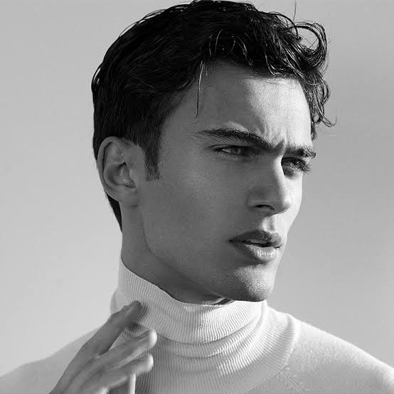 fashionable man wearing a gray outifit