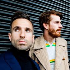 Who wrote “Unlikely Hero” by The Hoosiers?