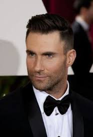 Fade side part haircut with skin fade touch and fade beard style. Adam Levine Haircut Google Search Adam Levine Haircut Adam Levine David Beckham Hairstyle Short