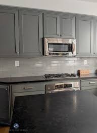 4 Subway Tile Ideas For Your Kitchen Backsplash And Bathroom Black Countertops Gray Tile Backsplash Grey Backsplash