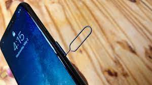 Push in, towards the iphone, but don't force it. How To Remove Or Switch Your Iphone Sim Card 9to5mac