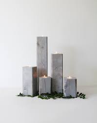Once you've done both legs, insert the edges of the log into the. Diy Wood Candle Holders Lindsay Stephenson