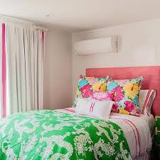 Soft, pastel wall colors paired with a brighter floral bedspread and decorations make a room that's feminine, but not overpowering. Pink And Green Teenage Girl Bedroom Design Ideas