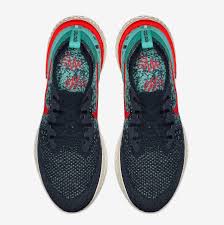 The shoe's flyknit upper works a mix of university red, hyper jade and sapphire into its knit, with contrasting black on the toe box. Nike Epic React Flyknit Hyper Jade Bordeaux Sneaker Bar Detroit