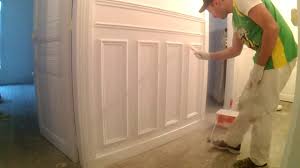 Wainscoting is commonly assembled from beadboard panels. Paint Chair Rails Wainscoting Haussmann Style Youtube