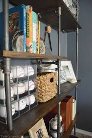 The boards were sanded and painted, and the pipe was only painted. Diy Industrial Pipe Shelves Table And Hearth