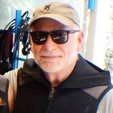 What are the best launch points and tidal current conditions for kayaking  to the New Point Comfort Lighthouse in Mobjack Bay?