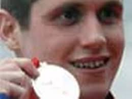 Olympian Davies takes silver in the 'swim of his life'