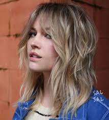 Medium Shaggy Blonde Hairstyle With Bangs In 2020 Medium Shag Haircuts Medium Hair Styles Medium Length Hair Styles