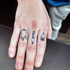 You can get a small moustache design inked on the outer length of the index finger. Minimalist Tattoo Men Finger Novocom Top