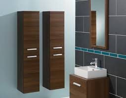 Throwing stuff here and there depicts your poor taste and lack of arrangement. Dark Wooden Bathroom Wall Cabinets With Ceramic Sink Ream