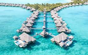 These Gorgeous Over Water Villas In Bora Bora Come With Glass Floors And Butler Service Bora Bora Resorts Water Villa Bora Bora