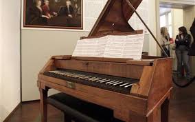 The boy wondered how he played the keyboard instrument in a music school. Piano S Black Keys Were White And White Keys Were Black In The Past Thepiano Sg