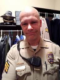 The TANS are back! Starting today, officers are officially back to wearing  their tan uniforms. A tradition since the Department's establishment in  1929. Here we see Officer Brian Allen, a motor officer