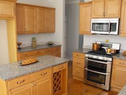 Pin By Deandrea Arndt On Favorite Places Spaces Grey Painted Kitchen Grey Countertops Maple Cabinets