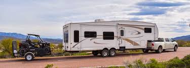 Towing fifth wheel with tool box. Triple Tow Or Toy Hauler How To Rv Full Time With A Rzr Roads Less Traveled