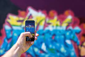 562750 Camera Creative Creativity Graffiti Hand Ios Iphone Mobile Phone Photographer Photography Pov Smartphone Street Art Taking Photo Touch Touchscreen Wall Art 4k Wallpaper Mocah Hd Wallpapers