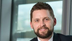 Legal giant bags Crisp as new director