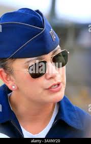 U.S. Air Force Capt. Stewart Holmes, 14th Airlift Squadron C-17 Globemaster  III pilot, showcases the C-17 cockpit to several local students during  Accelerating the Legacy 2023
