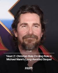 Christian Bale is being eyed for a role in Michael Mann's "Heat 2,"  according to a source with knowledge of the production. Bale previously  starred in Mann's “Public Enemies,” and, if deals