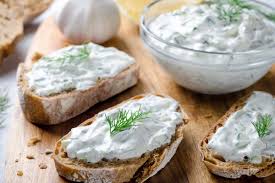 Stir together yogurt, grated cucumber, garlic, lemon juice, and olive oil in a bowl. Tzatziki Hard To Spell Easy To Make And Packed With Protein