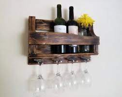 A great way to savor the memory of your favorite vintage and recycle pretty bottles into unique yard art, the durable, weatherproof wine holder simply stakes into the ground for creative outdoor display. Pin On Totti