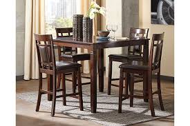 Old furniture often have a problem with dry rot and rust. Bennox Counter Height Dining Table And Bar Stools Set Of 5 Ashley Furniture Homestore