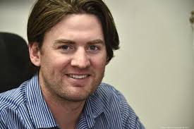 George Badcock bought Hacker Boat. Then, he rebuilt the entire business