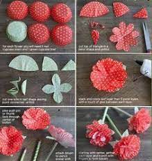 Now, scrunch up the wrapper until it begins to resemble a carnation flower. 240 Cupcake Papers Ideas Crafts Cupcake Liner Crafts Cupcake Liner Flowers