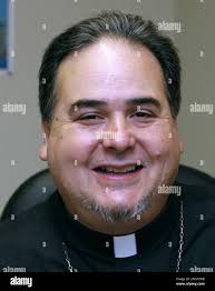 Catholic priest Bill Sanchez poses at St. Edwin Catholic Church in  Albuquerque N.M., Nov. 14, 2006. Sanchez had his DNA tested and learned his  genetic signature has a set of markers on