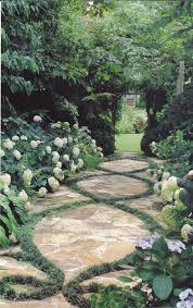Dwarf Mondo Grass Makes A Good Filler For Walkway Designs Like This One Charming Garden Beautiful Gardens Gorgeous Gardens