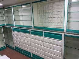 Here is an example of a modern visual screens: Medical Store Racks Counters Cabinet With Drawers Manufacturer From Nashik