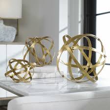 One of the options for table centerpieces is the sphere. Stetson Gold Spheres S 3 Uttermost