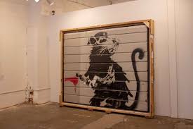 Sometimes that just means drawing a moustache on a girl's face on some billboard, sometimes that means sweating for days. Banksy In Texas Glasstire