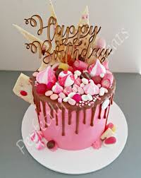 Pink And Chocolate Lolly Drip Cake With Layers Of White Velvet Cake And Whipped White Choc Ganache Topped With Chocola Drip Cakes Chocolate Lollies Lolly Cake